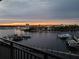 Evening waterfront view with marina and city lights at 654 Marina Point Dr # 654, Daytona Beach, FL 32114