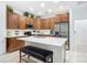 Modern kitchen with stainless steel appliances and an island at 667 Margaritaville Ave, Daytona Beach, FL 32124