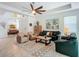 Open concept living room with comfortable seating and large artwork at 667 Margaritaville Ave, Daytona Beach, FL 32124