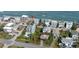 Aerial view showing home's location near beach access at 6911 Turtlemound Rd, New Smyrna Beach, FL 32169