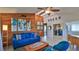 Open living space with coastal decor and blue accents at 6911 Turtlemound Rd, New Smyrna Beach, FL 32169