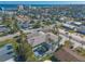 Aerial view of house and neighborhood, ocean in background at 708 Ocean Ave, New Smyrna Beach, FL 32169