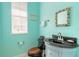 Charming bathroom with a jetted tub, double vanity, and glass shower at 708 Ocean Ave, New Smyrna Beach, FL 32169