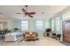 Relaxing living room featuring comfortable seating and wood floors at 708 Ocean Ave, New Smyrna Beach, FL 32169