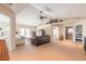 Spacious living room with high ceilings and access to deck at 708 Ocean Ave, New Smyrna Beach, FL 32169