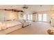 Spacious main bedroom with high ceilings, a large bed, and plenty of natural light at 708 Ocean Ave, New Smyrna Beach, FL 32169