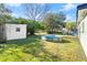 Large backyard with shed and above ground pool at 729 N Flamingo Dr, Daytona Beach, FL 32117