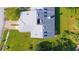 Top-down view of a single-Gathering home with gray roof and surrounding lawn at 933 Meadow View Dr # D, Port Orange, FL 32127