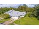 Aerial view showing house, landscaping, and driveway at 933 Meadow View Dr # D, Port Orange, FL 32127