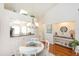 Light and airy dining room, adjacent to kitchen, features a white table at 933 Meadow View Dr # D, Port Orange, FL 32127