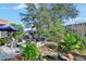 Landscaped backyard with fire pit and pond at 987 Mori Ct, Port Orange, FL 32127