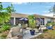 Relaxing backyard patio with fire pit and seating at 987 Mori Ct, Port Orange, FL 32127