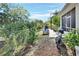 Landscaped backyard with patio and garden at 987 Mori Ct, Port Orange, FL 32127