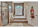 Relaxing bathroom with soaking tub and walk-in shower at 987 Mori Ct, Port Orange, FL 32127