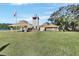 Countryside Club house with clock tower and flag at 987 Mori Ct, Port Orange, FL 32127