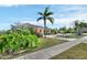 Single-story home with palm trees and manicured lawn at 987 Mori Ct, Port Orange, FL 32127