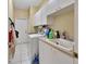 Laundry room with washer, dryer, and utility sink at 987 Mori Ct, Port Orange, FL 32127
