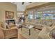 Living room showcasing a comfortable sectional and wood flooring at 987 Mori Ct, Port Orange, FL 32127