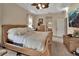 Bright and airy main bedroom with a comfortable wicker bed at 987 Mori Ct, Port Orange, FL 32127