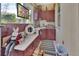 Outdoor bar with cabinets and granite countertop at 987 Mori Ct, Port Orange, FL 32127
