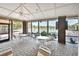 Screened-in patio area overlooking the pool at 987 Mori Ct, Port Orange, FL 32127