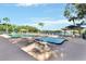 Community pool and spa with lake view at 987 Mori Ct, Port Orange, FL 32127