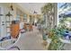 Bright and airy screened porch with exercise bike at 987 Mori Ct, Port Orange, FL 32127