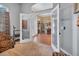 Bright sitting room with French doors opening to a dining area at 987 Mori Ct, Port Orange, FL 32127