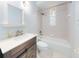 Clean bathroom with tub, shower, and modern vanity at 1004 Flying M Ct, Edgewater, FL 32132