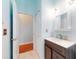 Guest bathroom with vanity and access to another room at 1004 Flying M Ct, Edgewater, FL 32132