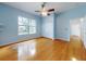 Bright bedroom with wood floors, double closets and a ceiling fan at 1004 Flying M Ct, Edgewater, FL 32132