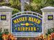 Massey Ranch Airpark entrance sign at 1004 Flying M Ct, Edgewater, FL 32132