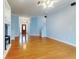 Living room, hardwood floors and entryway view at 1004 Flying M Ct, Edgewater, FL 32132