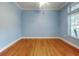 Light and airy office with hardwood floors and large windows at 1004 Flying M Ct, Edgewater, FL 32132