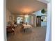 Elegant dining room featuring a chandelier and large mirror at 1104 Red Maple Way, New Smyrna Beach, FL 32168