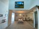 Bright dining room with a large framed print and mirror at 1104 Red Maple Way, New Smyrna Beach, FL 32168