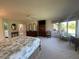 Large main bedroom with ample space and golf course views at 1104 Red Maple Way, New Smyrna Beach, FL 32168