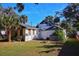 Large backyard with detached garage and green space at 1116 Magnolia St, New Smyrna Beach, FL 32168