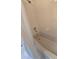 Bathroom featuring a standard bathtub, shower head, and white tile at 113 Lagoon Ct, New Smyrna Beach, FL 32169