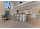 Kitchen area featuring seating and bar top with a large window at 113 Lagoon Ct, New Smyrna Beach, FL 32169