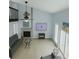 Bright living room with fireplace, high ceilings, large windows, and an airy feel at 113 Lagoon Ct, New Smyrna Beach, FL 32169
