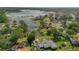 Aerial view of the house and lakefront property at 1339 N Fowler Dr, Deltona, FL 32725