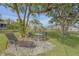 Peaceful backyard patio with seating and lush landscaping at 1339 N Fowler Dr, Deltona, FL 32725