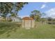 Metal storage shed in backyard, providing ample storage space at 1339 N Fowler Dr, Deltona, FL 32725