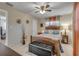 Cozy bedroom with wood bed frame and ceiling fan at 1339 N Fowler Dr, Deltona, FL 32725