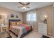 Cozy bedroom featuring a comfortable bed and stylish decor at 1339 N Fowler Dr, Deltona, FL 32725