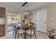 Bright dining area with wood table and chairs, view to backyard at 1339 N Fowler Dr, Deltona, FL 32725