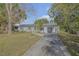 Newly renovated home with a paved driveway at 1339 N Fowler Dr, Deltona, FL 32725