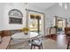 Casual dining area with a round table and chairs near sliding doors to backyard at 1409 Arbitus Cir, Oviedo, FL 32765