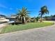 House exterior with boat and lush landscaping at 1424 Breaks Way, Port Orange, FL 32127